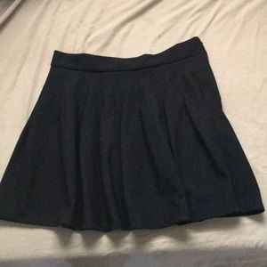 This is Black school girl skirt from Rainbow size large.